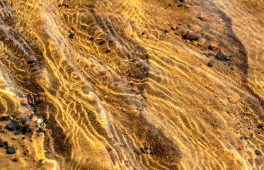 River bottom texture on a sunny July day.