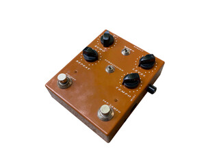 Isolated brown analog deley stompbox electric guitar effect for studio and stage performed on white background with clipping path. side view photo. music concept..