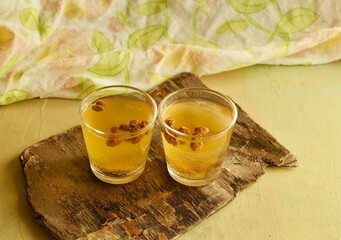 Two gasses of traditional mead drink with raisins