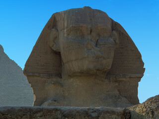 The face of the Great Sphinx at Giza, Egypt in the summertime