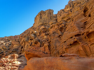 Folds of coloured rock strata on thew walls of the Coloured Canyon near Nuweiba, Egypt in the...