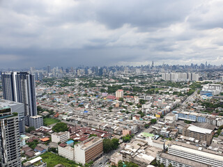 Fototapeta na wymiar Top view city scape high building, center town . Cloudy sky Like it was raining Bangkok Thailand.