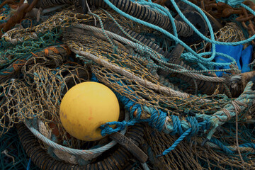 Old fishing tackle ropes nets floats. Mallaig Harbour, Scotland
