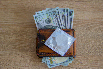 Money in wallet is to pay for services for sex.