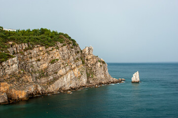 Rock "Sail" in the Crimea. View of the bay from the height of the cliff. Summer vacation concept.