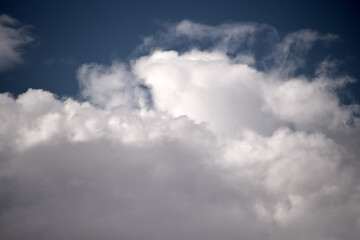 Cumulus clouds look like fluffy, white cotton balls in the sky..Monsoon rain clouds forming
