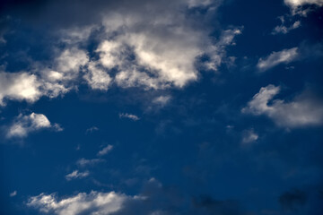 Storm clouds forming during monsoon season..Dark clouds and dramatic sky.