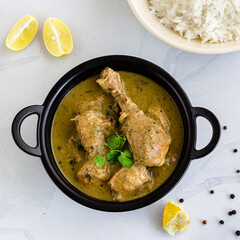 Chicken with Black Pepper- Spicy India Chicken Curry in a Kadhai Top Down Square Photo
