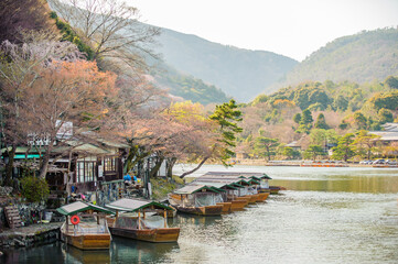 Fototapeta na wymiar View of the Katsura River in early springtime. Arashiyama, Kyoto, Japan.