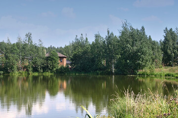 country house on the shores of lake