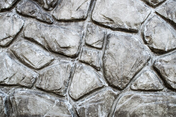 background of a part of the textured wall in the form of individual stones