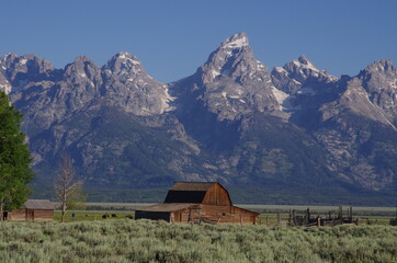 Fototapeta na wymiar Mormon barn in front of the Grand Tetons, Mt. Moran