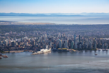 Obraz premium Downtown Vancouver, British Columbia, Canada. Aerial View of Coal Harbour and Modern Urban City during a Sunny Day.