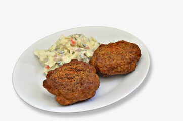 Two Meatballs with Potato salad, isolated on white Plate
