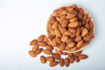 nuts almonds in a Cup on a white background