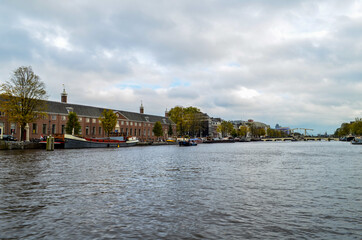 Around the canals of Amsterdam, seeing bridges, buildings, towers and all things of this beautiful city