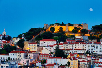Jorge Castle with Baixa district in foreground and Alfalma(the old city) in the background)during the blue hour
