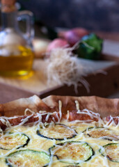 Traditional homemade french cake with courgette and onion. Homemade cake. Healthy vegetable food. Close up. Selective focus.