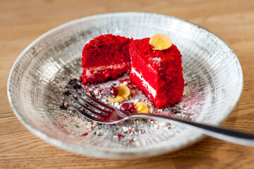 Red sweet dessert on a white plate. Sweetness on a beautiful dish. Sweet cake