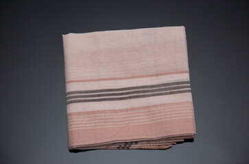  handkerchief with brown  lines on the black background