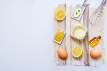 ingredients for making homemade mayonnaise sauce top view flat lay