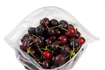 Fresh cherries in a plastic bag for sale