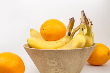 Banany i pomarańncze w misce, bananas and oranges w misce © Mefik