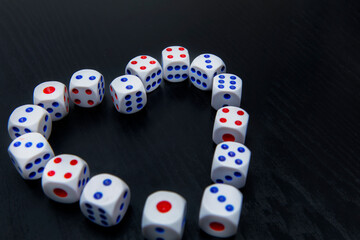 White dice organized in heart symbol
