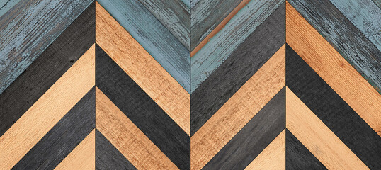 Weathered barn boards texture. Multicolored wooden wall with herringbone pattern. 