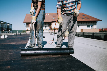 Bituminous membrane waterproofing system details and installation on rooftop. Professional...