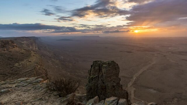 Time lapse of a cloudy sunrise over Machtesh Ramon (Ramon Crater), Negev Desert, Israel