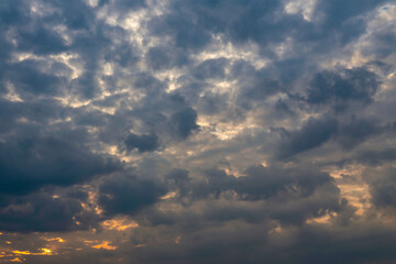 Sun beams or light rays breaking through the clouds.
