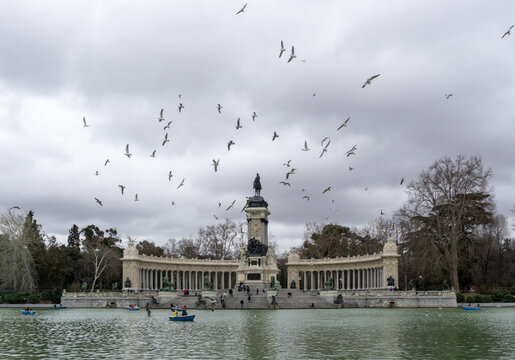 Artifical lake and monument to Alfonso XII in the Buen Retiro Park, one of the main attractions of Madrid, Spain.