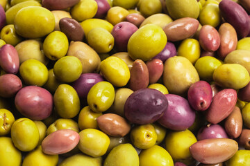 Tasty mix olives background.