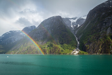 Double rainbow in front of mountains in Alaska