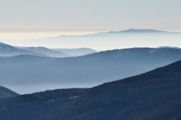 View on the Bieszczady mountains, Poland in fog.