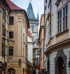 Narrow passageway in central Prague with view of Bell Tower 