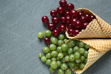 Poured berry from an ice cream cone on a dark blue background.