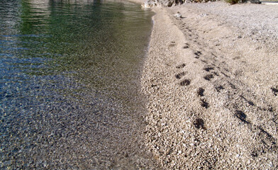 Scene on the beach, footprints in the sand!