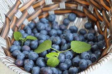 Blueberries in a basket with mint