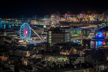 Old Port Genoa Italy at night with ferris wheel