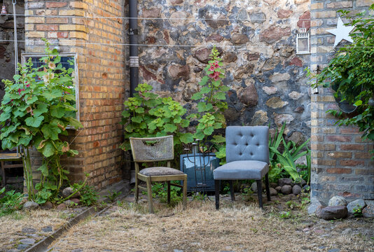 Courtyard living room in Uzupis an alternative neighbourhood in the old town of Vilnius, Lithuania.
