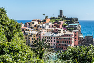 Obraz premium aerial view of Vernazza in the Cinque Terre with colorful houses and flowers