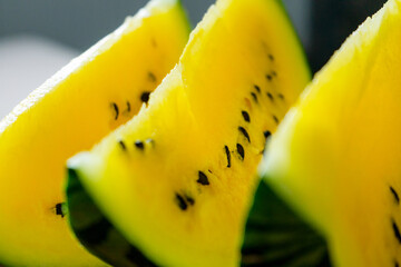 yellow watermelon in hand