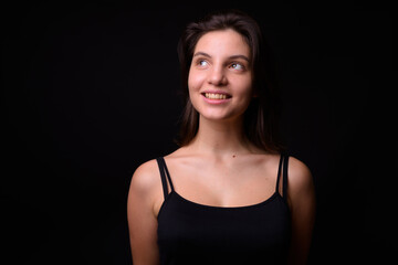Fototapeta premium Portrait of young beautiful woman with short hair