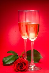 Champagne and red rose