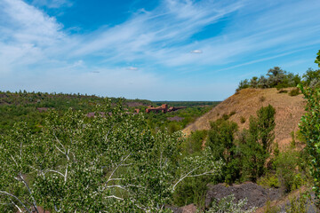 Fototapeta na wymiar Ukraine, Krivoy Rog, the 16 of July, scenic view from the hill on mine site, city limits.