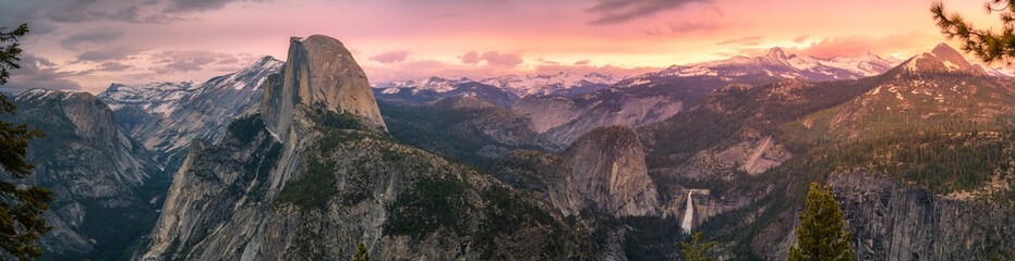 half dome and waterfalls from glacier point in yosemite national park at sunset