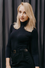 Nice young blonde woman portrait. Vertical shot