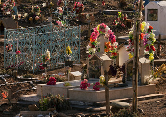 Culture and religion. Closeup of a traditional grave decoration in the ancient aboriginal cemetery in the desert and mountains.